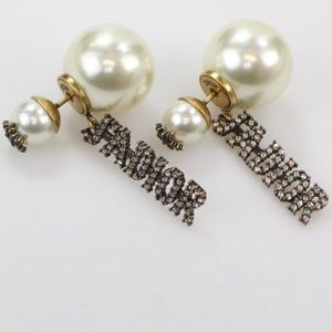 Used CHRISTIAN DIOR TRIBALES PEARL J'ADIOR CHARM EARRINGS